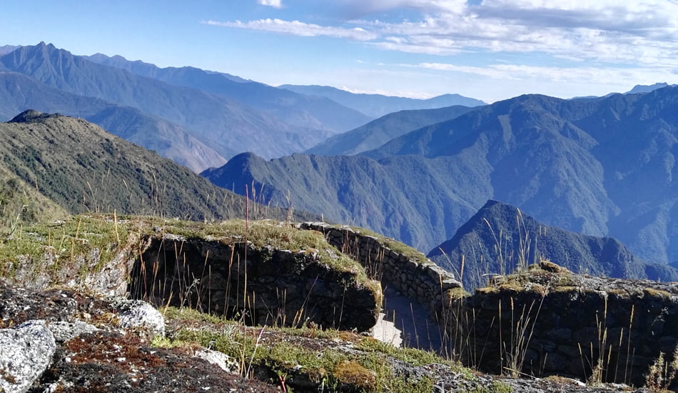 Salkantay and inca trail - Phuyupatamarca site in the back Machu Picchu mountain